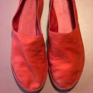 Orange moccasins shoes.